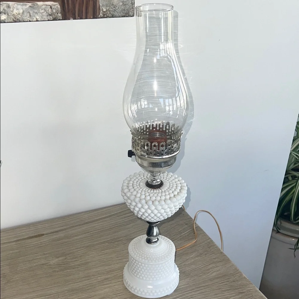 White MILK GLASS hobnail with a hurricane chimney. Tested and works.